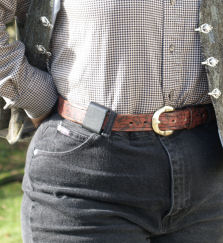 Tuckable kydex holster with single belt loop, appendix carried. Image courtesy Bob Jackson.