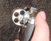 Visual illustration of how an 'unloaded' revolver can still be loaded. Always, always, always double check by counting the holes.